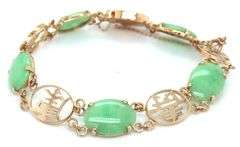 Oval Jade good fortune bracelet in 14kt Yellow gold