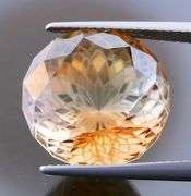 Intricately cut! 19.61ct REAL Imperial Topaz!