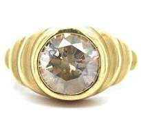 18kt Yellow gold round brilliant cut bezel set diamond ring