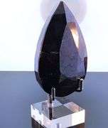 Holy cow! It's a 1,374ct Ruby in Matrix! With a stand!