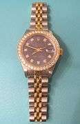 LADY'S ROLEX QUICKSET DATEJUST 18K AND STAINLESS STEEL WITH AFTERMARKET DIAMOND BEZEL AND DIAL