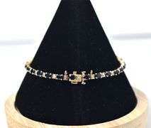 Elegant 14K Yellow Gold Blue Sapphire Gemstone Bracelet with Diamond Accents