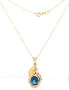 14kt Yellow gold oval London topaz and diamond enhancer pendant on chain