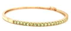 14kt Yellow gold round Peridot bangle bracelet