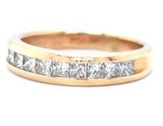 Glittering 14K YG Band with Channel Set Princess Cut Diamonds