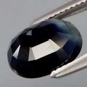 Midnight blue but bi-colored? YES! 2.16ct 8x6mm Sapphire!