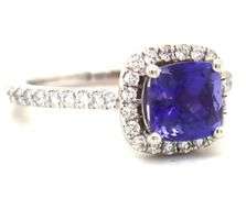 14kt White gold cushion cut Tanzanite and diamond halo ring