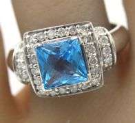 14kt White Gold approximate 1.60ct Blue Topaz and 0.30ctw Diamond Ring
