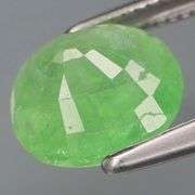 Holy cow! It's a 2.12ct color change Tsavorite Garnet!