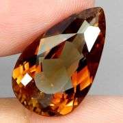 Outstanding 14.07ct VVS grade whiskey red Imperial Topaz