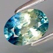 Strong color seperation! .98ct blue and yellow Parti Sapphire! Heated only!