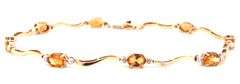 14kt Yellow gold oval citrine woven link station bracelet