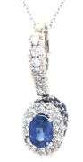 14kt White gold blue sapphire and diamond halo and sapphire under halo enhancer pendant on chain