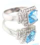 14kt White Gold approximate 1.60ct Blue Topaz and 0.30ctw Diamond Ring