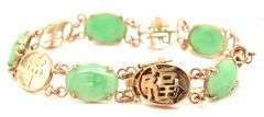 Oval Jade good fortune bracelet in 14kt Yellow gold