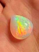 Magnificent 6.42ct full body rainbow chaff flashing Welo Opal