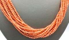 Coral beaded twisted necklace