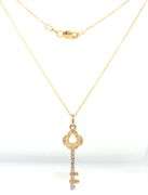 14kt Two tone gold diamond key pendant on chain
