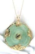 14kt Yellow gold round Jade Fortune pendant on chain