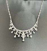 Most Beautiful bridal necklace in sterling silver and Dancing Swarovski center.