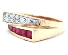14kt Yellow gold square ruby and diamond bypass ring