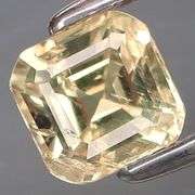 Heated only! 5x5mm aged champagne Sapphire weighing .94 carats!