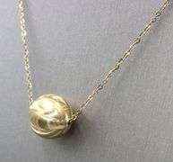 18kt Yellow gold textured ball necklace