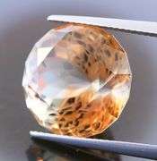 Intricately cut! 19.61ct REAL Imperial Topaz!