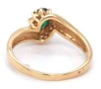 Feminine 14k Yellow Gold Ring with Pear Shaped Emerald