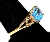 Elegant 10K Yellow Gold Blue Topaz Gemstone Ring with Diamond Accents