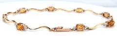14kt Yellow gold oval citrine woven link station bracelet