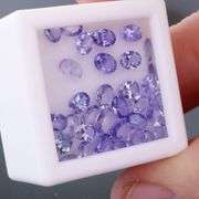 Glittering 5.59ct UNTREATED oval cut Tanzanite set