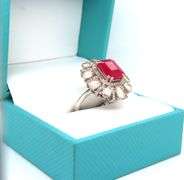 Charming 5.25CTS Emerald Cut Ruby & Diamond Halo Adjustable Ring in Sterling Silver