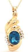 14kt Yellow gold oval London topaz and diamond enhancer pendant on chain