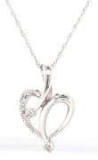 10kt White gold diamond heart shaped pendant on chain necklace