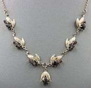 10kt Yellow gold black star sapphire cab and ruby necklace