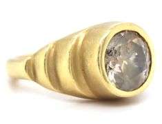 18kt Yellow gold round brilliant cut bezel set diamond ring