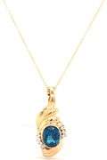 14kt Yellow gold oval London topaz and diamond enhancer pendant on chain