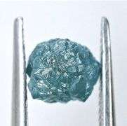 CONTENT OF SAFE DEPOSIT BOX: LOOSE RAW 1 CT. BLUE DIAMOND