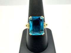 Breathtaking 14 kt Yellow Gold Plate 6.5 Ct Emerald Cut Simulated Swiss Blue Topaz Ring