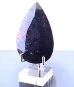 Holy cow! It's a 1,374ct Ruby in Matrix! With a stand!