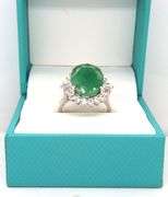 Sparkling 8.63CTS Oval Faceted Emerald & 1.11CTW White Sapphire Ring in Sterling Silver
