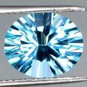 Fiery! Non-stop full body flashing 8.66ct concave cut Topaz!