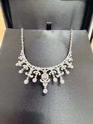 Most Beautiful bridal necklace in sterling silver and Dancing Swarovski center.