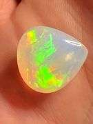 Magnificent 6.42ct full body rainbow chaff flashing Welo Opal