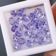 Heavy flashing! Untreated! 4.75ct oval cut Tanzanite set!