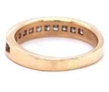 Glittering 14K YG Band with Channel Set Princess Cut Diamonds