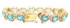 Mesmerizing 11.80CTW Oval Shaped Faceted Apatite & 2.10CTW Diamond Bracelet in 14K Yellow Gold Over 