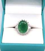 Sparkling 8.63CTS Oval Faceted Emerald & 1.11CTW White Sapphire Ring in Sterling Silver
