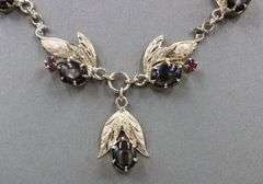 10kt Yellow gold black star sapphire cab and ruby necklace